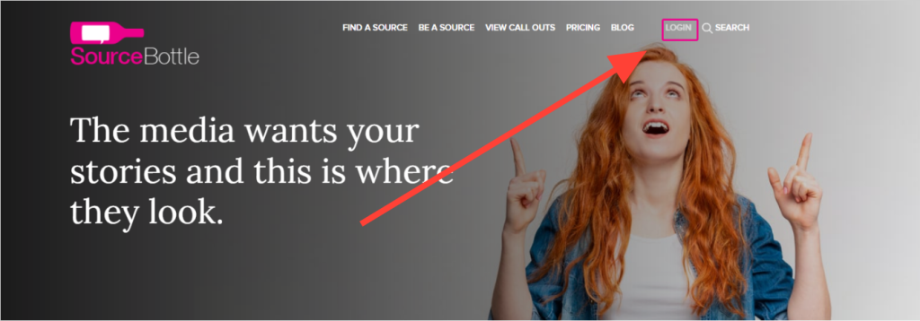 A smiling woman with long red hair points upward with both index fingers. A large red arrow highlights the LOGIN button in the website’s top navigation bar. The text on the left reads: Create your Expert Profile—media and Subscribers want your stories on SourceBottle.