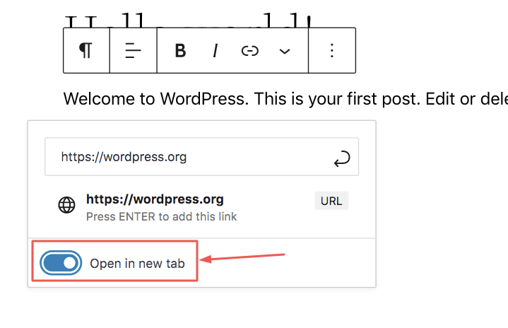 A WordPress link settings menu showing the option Open in new tab with a toggle switch turned on and highlighted by a red box and arrow.