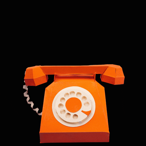 Animated orange paper rotary phone spins, then transforms into a flat envelope, symbolising sending messages or transitioning from phone calls to PR pitches, on a black background.